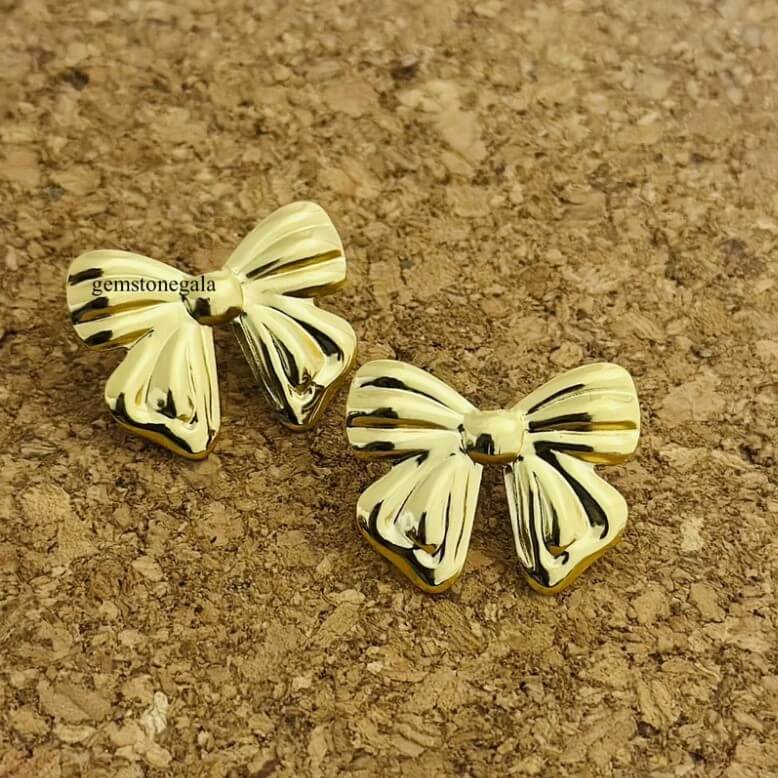 Golden Bow Stud Earrings – Minimalist Statement Jewelry for Women