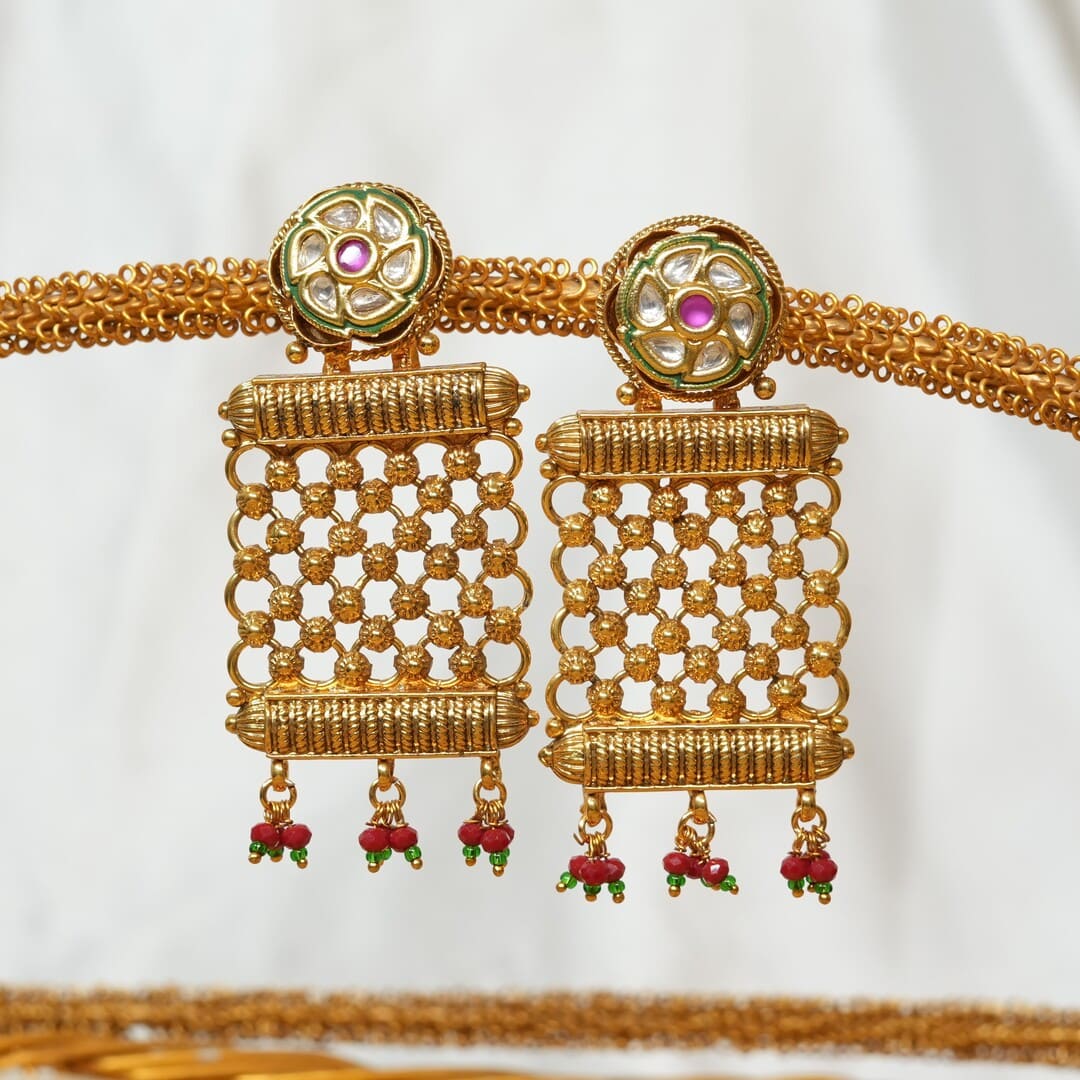 Designer Criss Cross Design Gold Plated Kundan and Ruby Stone Earrings