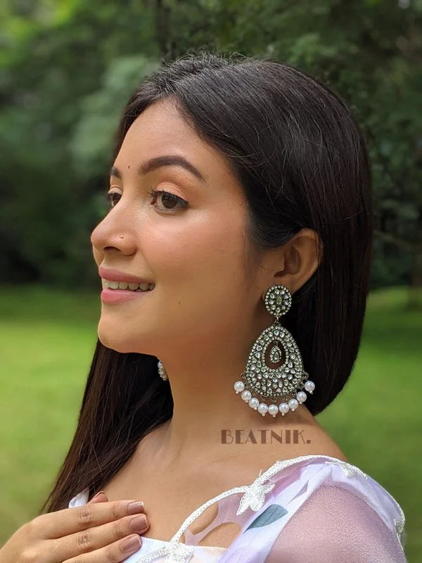 Adya Black Gun Metal Oval Earrings with Kundan & Pearl Drops