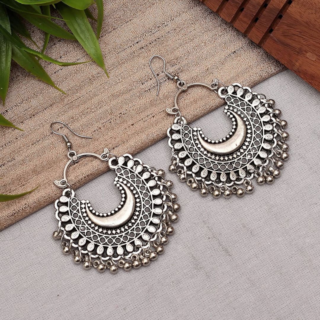 Buy Black Stone studded Oxidised Earrings with hanging pearls at Amazon.in